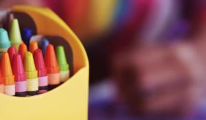 Image: brightly colored box of crayons. Title: 5 Everyday Products that May Have Lurking Asbestos
